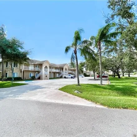 Rent this 2 bed condo on 150 Cypress Way East in Palm River, Collier County
