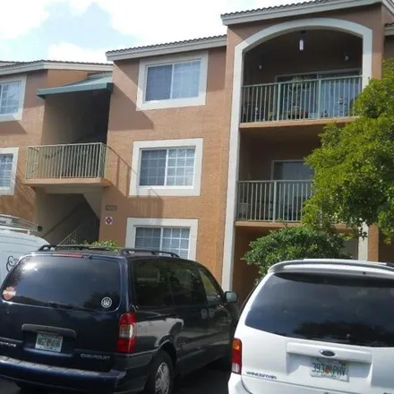 Rent this 2 bed condo on 1220 Wildwood Lakes Blvd Apt 103 in Naples, Florida