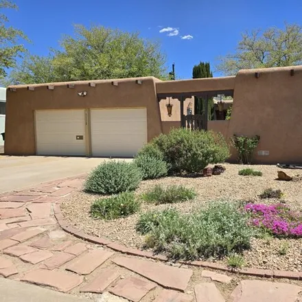 Buy this 3 bed house on 3148 Blume Street Northeast in Matheson Park, Albuquerque