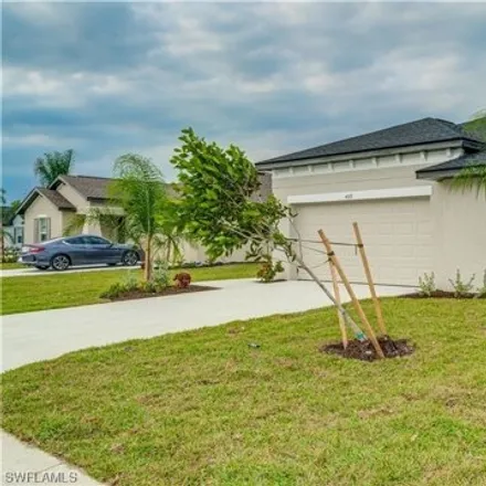 Rent this 4 bed house on San Clemente Court in Sabal Springs, Lee County
