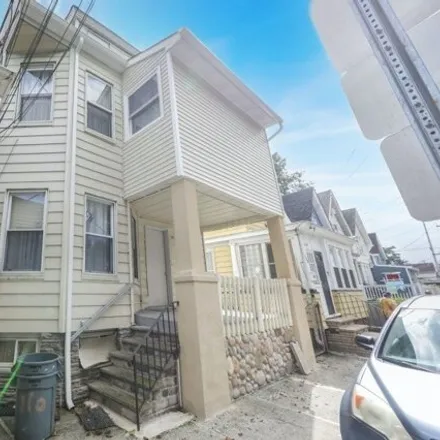 Buy this 8 bed house on 115 Burhans Avenue in Paterson, NJ 07522