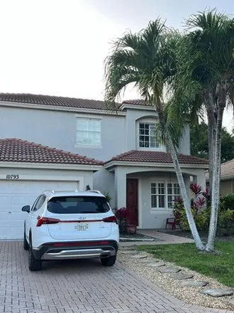 Rent this 4 bed house on Oak Bend Way in Wellington, FL 33447