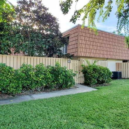 Buy this 2 bed townhouse on 811 Blue Ridge Circle in West Palm Beach, FL 33409