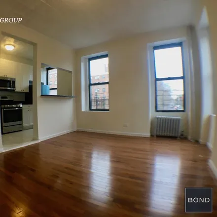 Rent this 2 bed apartment on 402 E 115 St in New York, NY