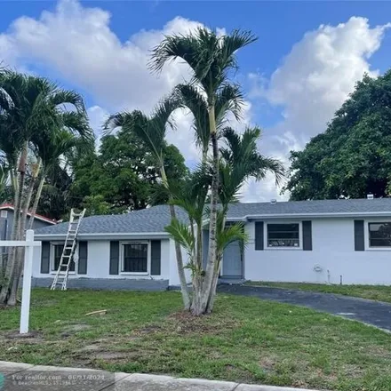 Buy this 4 bed house on 3521 NW 6th Pl in Lauderhill, Florida