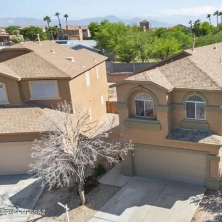 Buy this 3 bed house on 7998 South Baja Stone Avenue in Tucson, AZ 85756