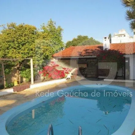 Buy this 4 bed house on Rua Tamandaré in Cristal, Porto Alegre - RS