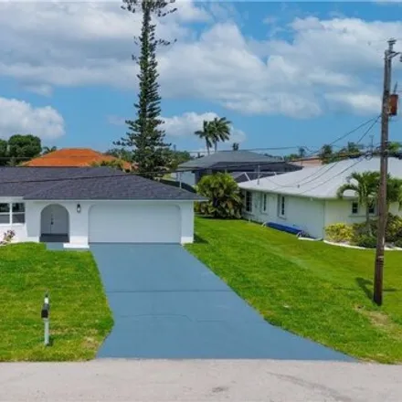 Buy this 3 bed house on 1462 Southeast 23rd Place in Cape Coral, FL 33990