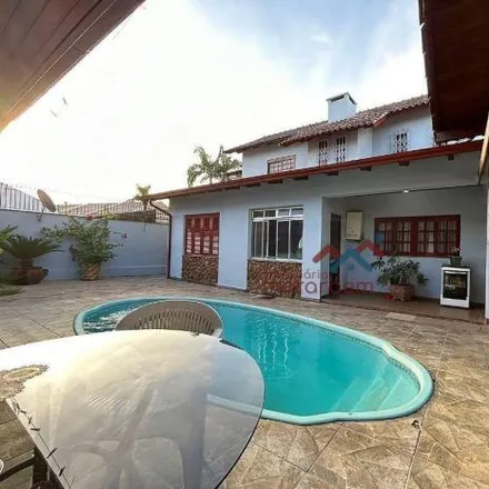 Buy this 5 bed house on Rua das Araras in Harmonia, Canoas - RS