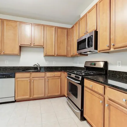 Rent this 2 bed apartment on North Point Village Center in 1509 North Point Drive, Reston