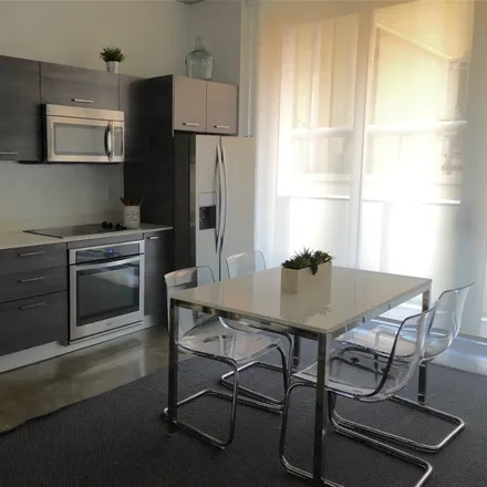 Rent this 1 bed loft on 7-Eleven in 1 West Flagler Street, Miami