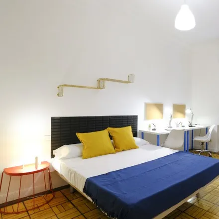 Rent this 7 bed room on Madrid in Hermanas Trinitarias, Calle de Martín de los Heros