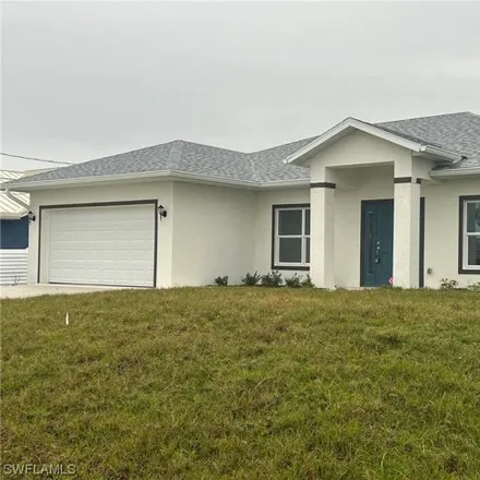 Buy this 3 bed house on 1225 NW 37th Ave in Cape Coral, Florida