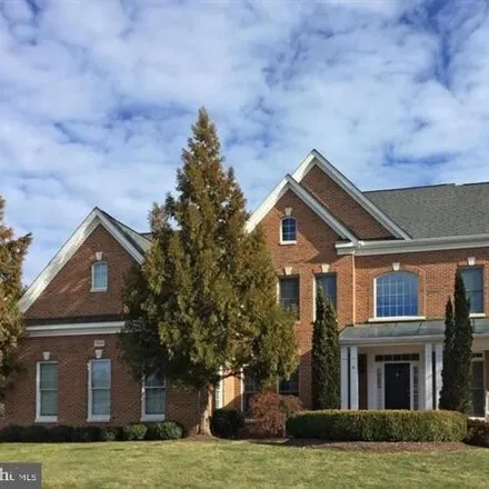 Rent this 4 bed house on 6069 Tinley Mill Drive in Haymarket, Prince William County