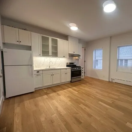 Rent this 2 bed house on 7014 10th Avenue in New York, NY 11228