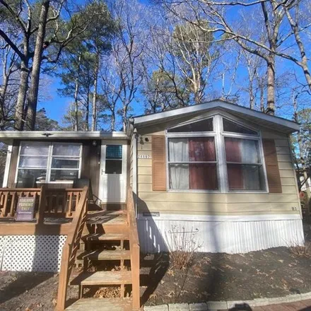 Buy this studio apartment on 24433 White Street in Pine Water Landing, Sussex County