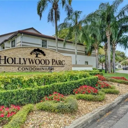 Rent this 3 bed condo on South Luna Court in Hollywood, FL 33021