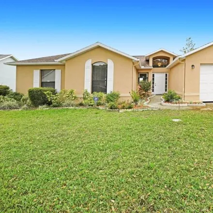 Buy this 3 bed house on 3947 Tangle Drive in Titusville, FL 32796