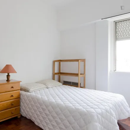 Rent this 4 bed room on Vale Escuro in Avenida Mouzinho de Albuquerque, 1170-284 Lisbon