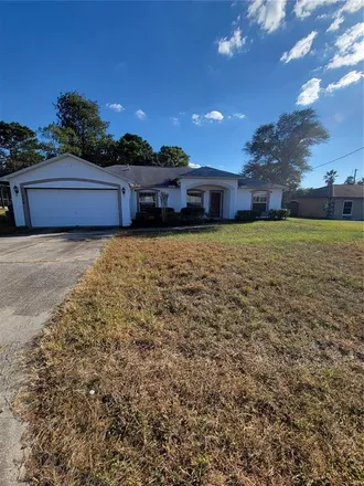 Rent this 4 bed house on 11352 Palomar Street in Spring Hill, FL 34609