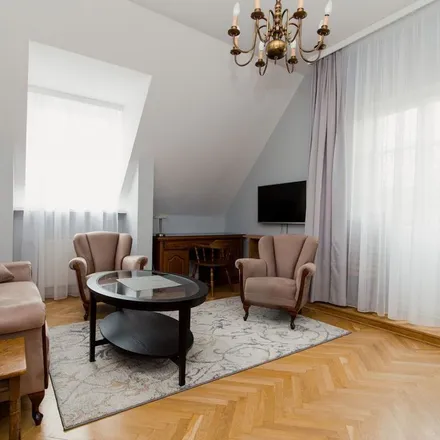 Rent this studio apartment on Sanktuarium Matki Bożej Łaskawej in Świętojańska 10, 00-288 Warsaw