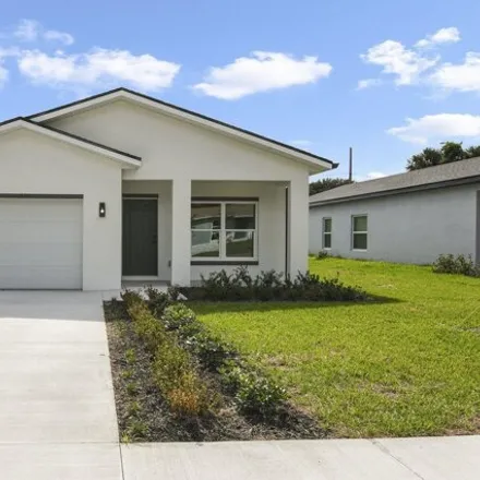 Buy this 3 bed house on 1535 Elizabeth Ave in Titusville, Florida