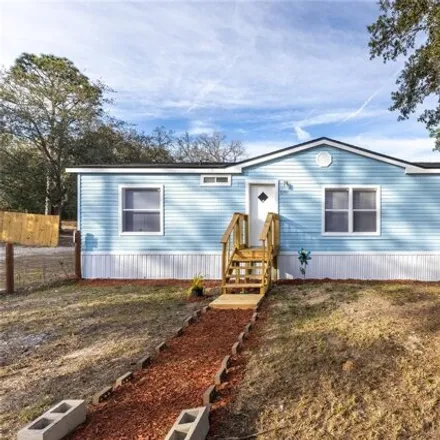Buy this studio apartment on 8383 Northeast 117th Place in Levy County, FL 32621