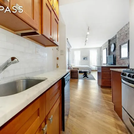 Rent this 1 bed apartment on 73 Sullivan Street in New York, NY 10012