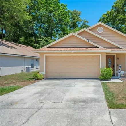 Buy this 4 bed house on 1175 Whispering Winds Court in Apopka, FL 32703