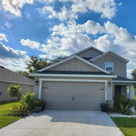 Buy this 4 bed house on Pearly Ridge Lane in Polk County, FL 33809