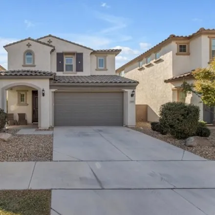 Rent this 4 bed house on 9541 East Travertine Avenue in Mesa, AZ 85212