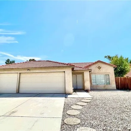 Rent this 4 bed house on 14547 Juniper Lane in Adelanto, CA 92301