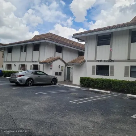 Rent this 3 bed townhouse on 10787 Royal Palm Boulevard in Coral Springs, FL 33065