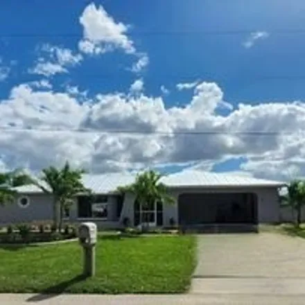 Buy this 3 bed house on 1042 Southeast 30th Street in Cape Coral, FL 33904