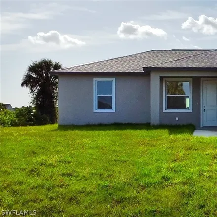 Buy this 3 bed house on 1035 Plantation Road in Lehigh Acres, FL 33974