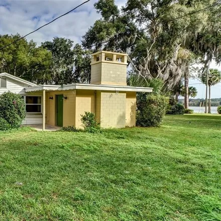 Rent this 3 bed house on 2141 East New York Avenue in DeLand, FL 32724