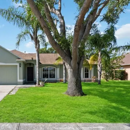 Rent this 3 bed house on 1038 Jacaranda Circle in Rockledge, FL 32955
