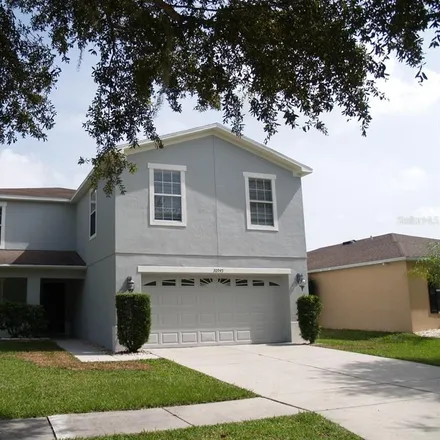Buy this 6 bed house on 31069 Mandolin Cay Avenue in Pasco County, FL 33543