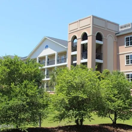 Buy this 2 bed condo on Cape Fear Regional Jetport in 4019 Long Beach Road, Oak Island