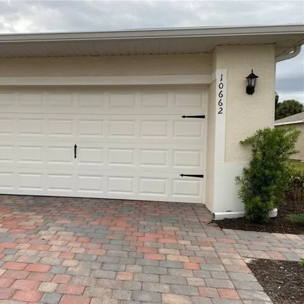 Rent this 2 bed house on 10772 Crossback Lane in Lehigh Acres, FL 33936