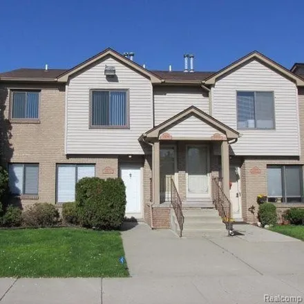 Rent this 2 bed condo on 24156 Ashford Lane in Clinton Township, MI 48036