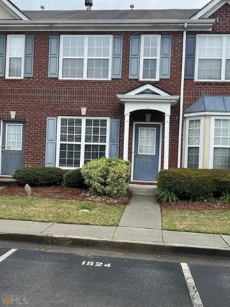 Rent this 2 bed townhouse on 1564 Cove Creek Circle in Gwinnett County, GA 30093