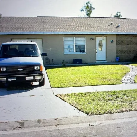 Buy this 2 bed house on 914 Alabama Woods Lane in Meadow Woods, Orange County