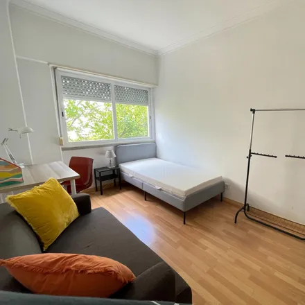 Rent this 3 bed room on Rua Maria Pimentel Montenegro in 1500-249 Lisbon, Portugal