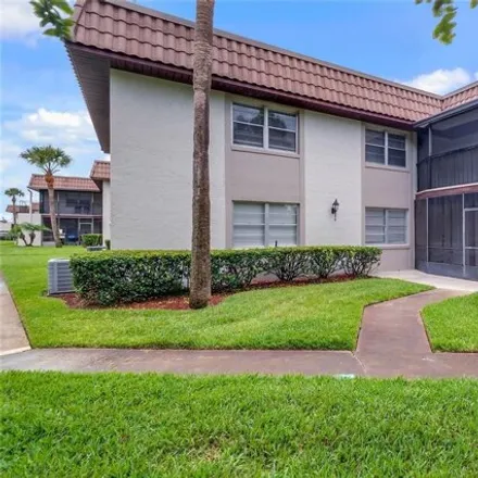 Rent this 2 bed condo on 39 Windtree Ln # 104 in Winter Garden, Florida