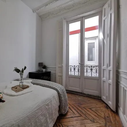 Rent this 11 bed room on Calle Preciados in 42, 28013 Madrid