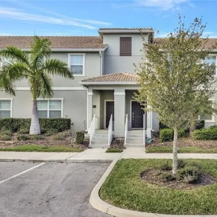 Buy this 4 bed townhouse on 4815 Lullaby Ln in Kissimmee, Florida