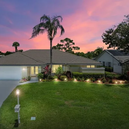 Buy this 3 bed house on Saint Lucie Trail Golf Club in 951 Southwest Country Club Drive, Port Saint Lucie