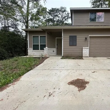 Rent this 4 bed house on 6429 Oak Knoll Road in Montgomery County, TX 77316