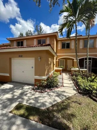 Rent this 3 bed townhouse on 3164 Waddell Avenue in West Palm Beach, FL 33411